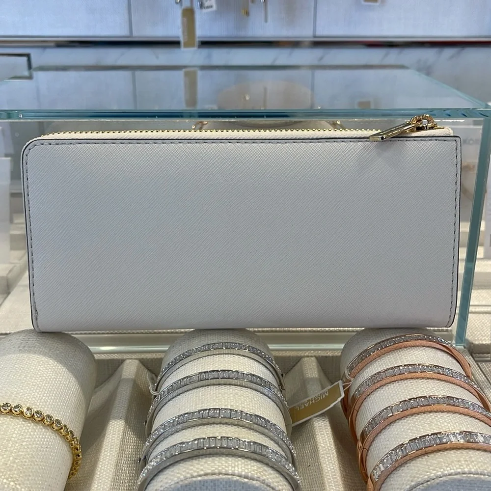 MICHAEL KORS Jet Set Travel Lg Saffiano Leather Quarter-Zip Wallet Light Cream